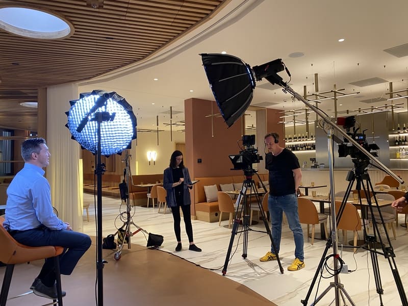 Behind the scenes of a corporate video shoot using the Saramonic WiTalk9