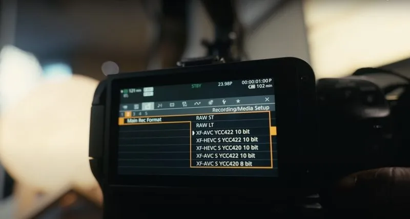 A close-up view of a camera's recording settings interface showing various video formats and recording options.