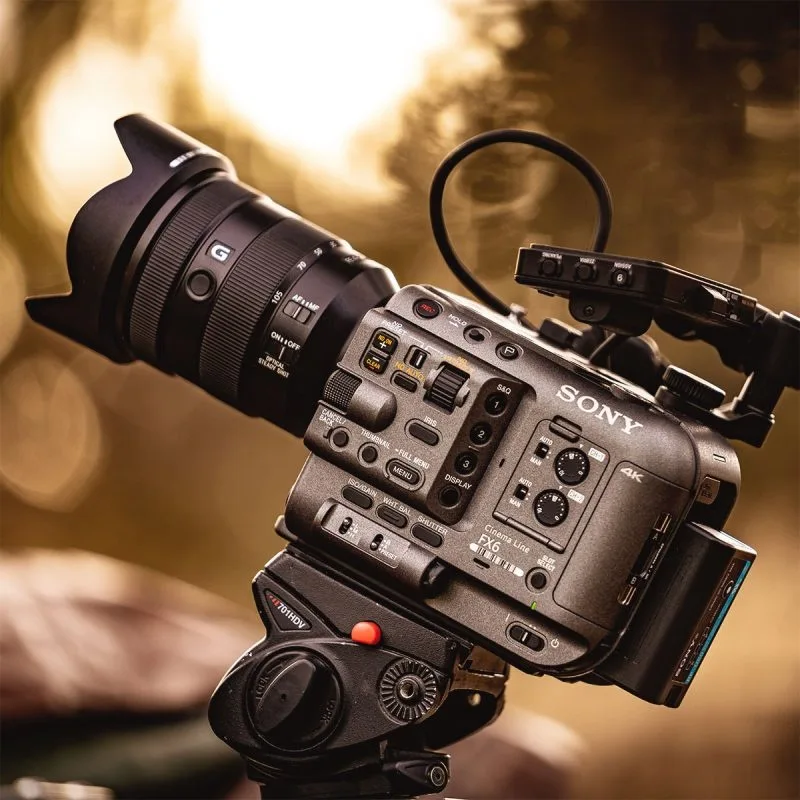 A close-up view of a Sony camera with a high-quality lens, showcasing advanced filming technology.